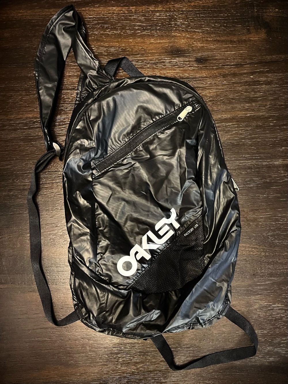Oakley FactoryLite self packing backpack zip closure adjustable strap